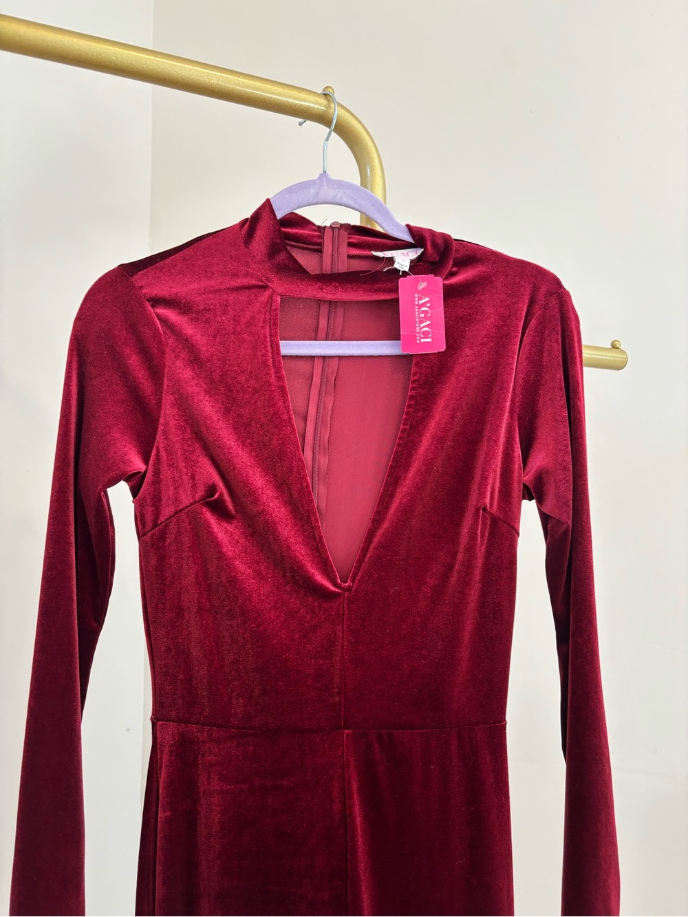 a'gaci Burgundy Velvet Long-Sleeve Jumpsuit with Gold Chain